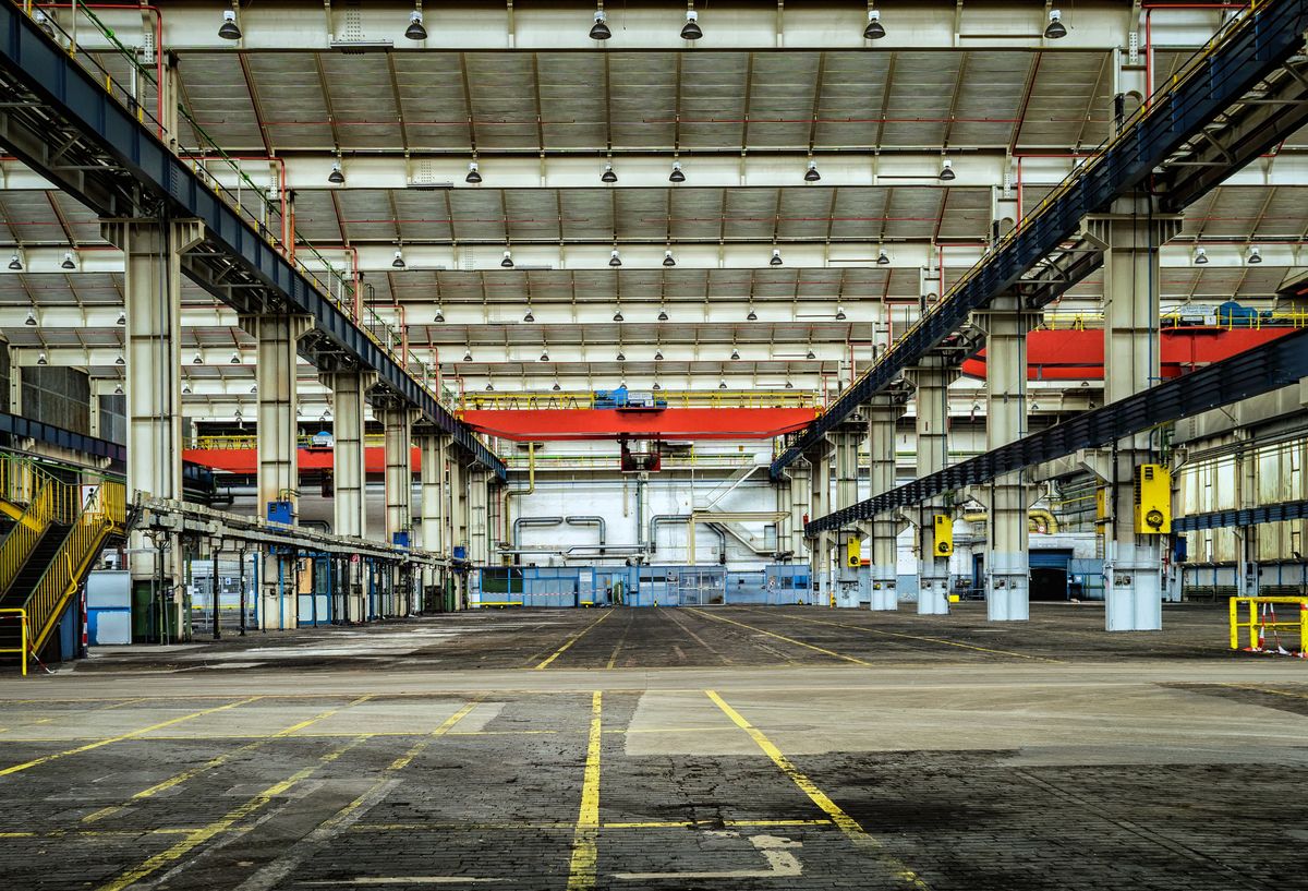 Commercial warehouse exterior with large bay doors