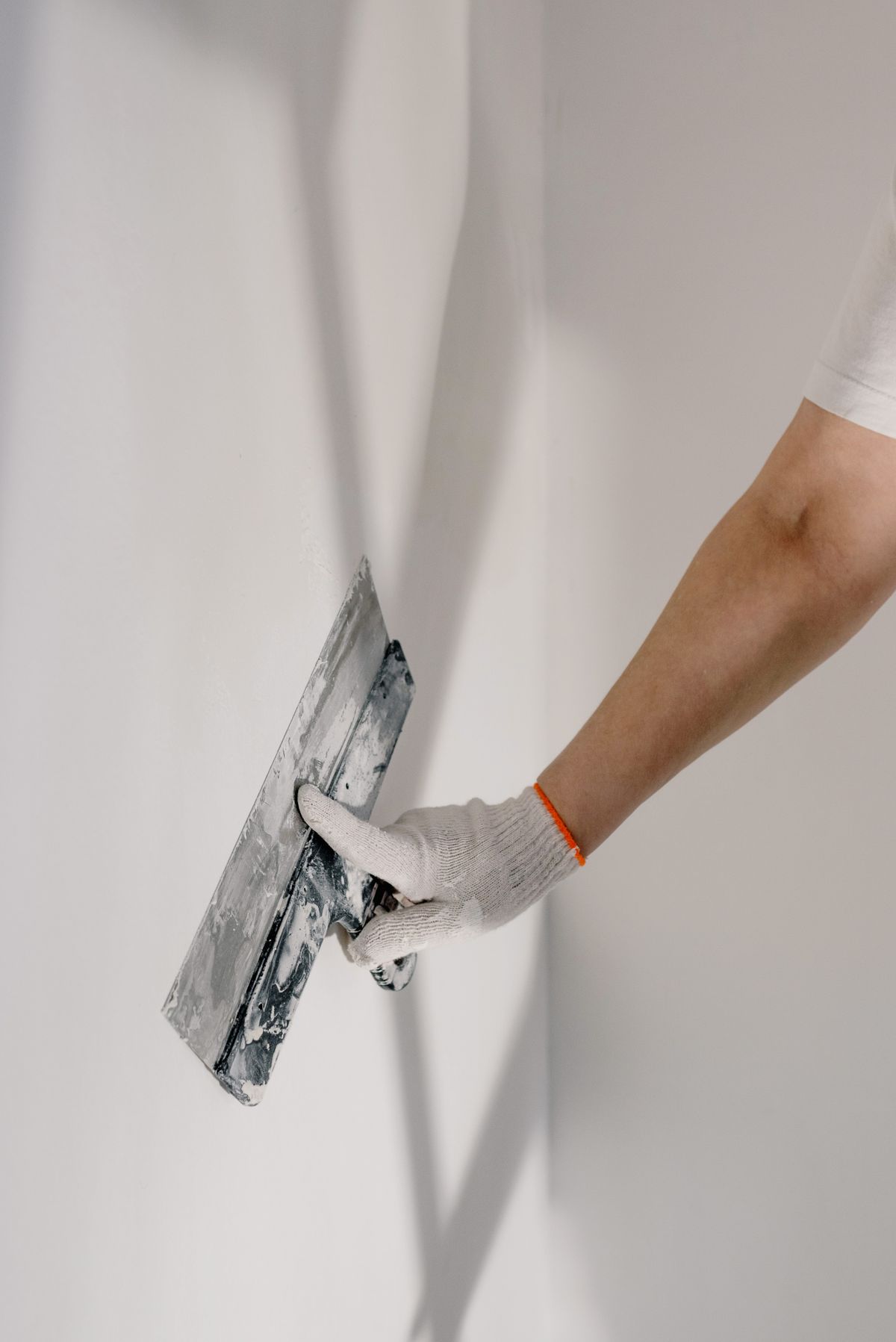 Technician working on door hardware during install